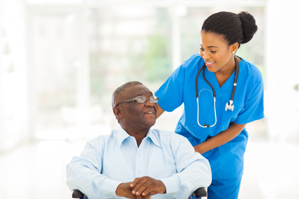 Nurse having a friendly conversation with a patient