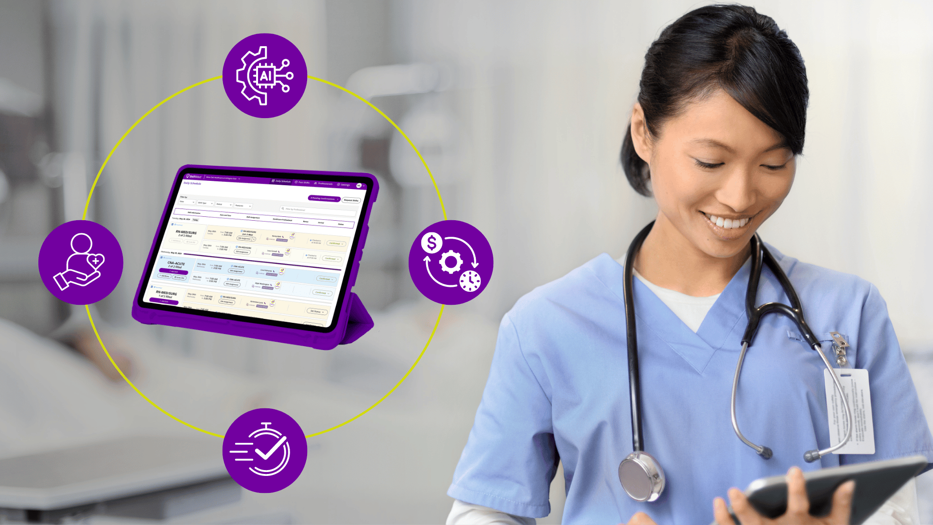 A nurse is smiling while looking at a tablet in a hospital room.