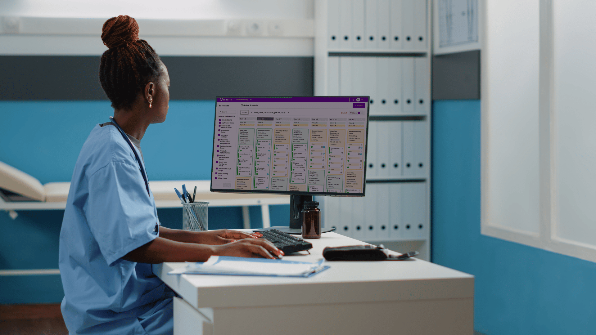Nurse reviewing ShiftMed dashboard on hospital computer to optimize schedules and manage workforce efficiency.