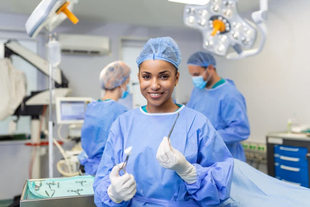 Surgical nurse holding surgical tools
