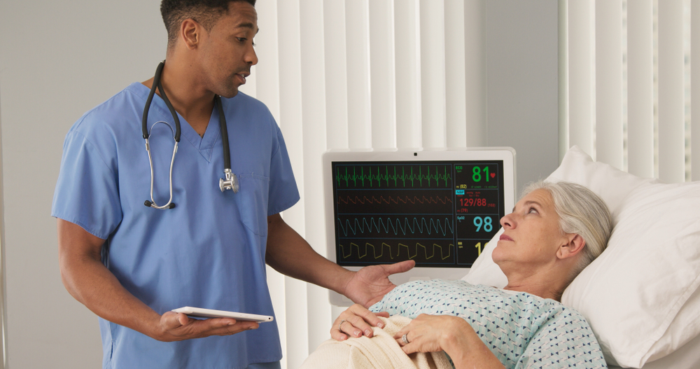 Telemetry nurse monitoring a patient