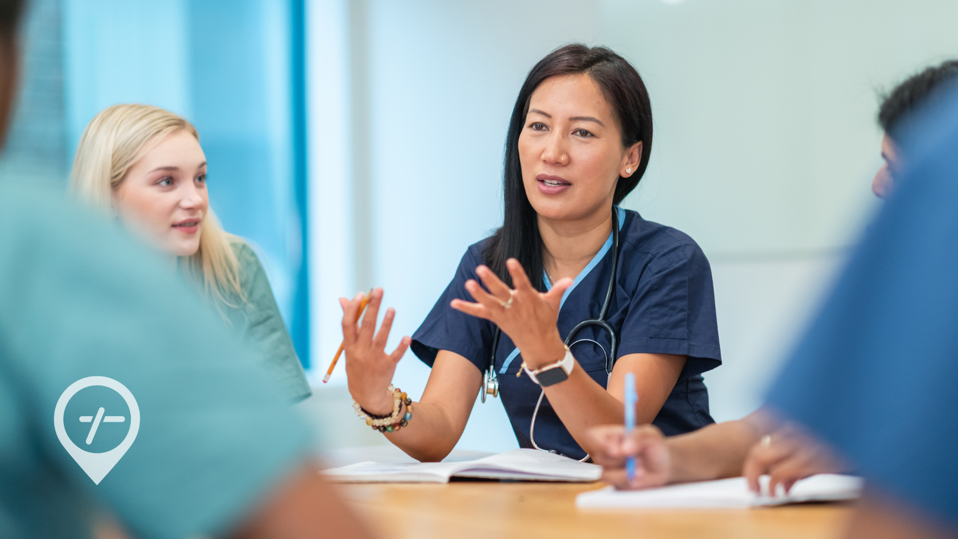 A female nurse is advocating for herself during a healthcare team meeting.