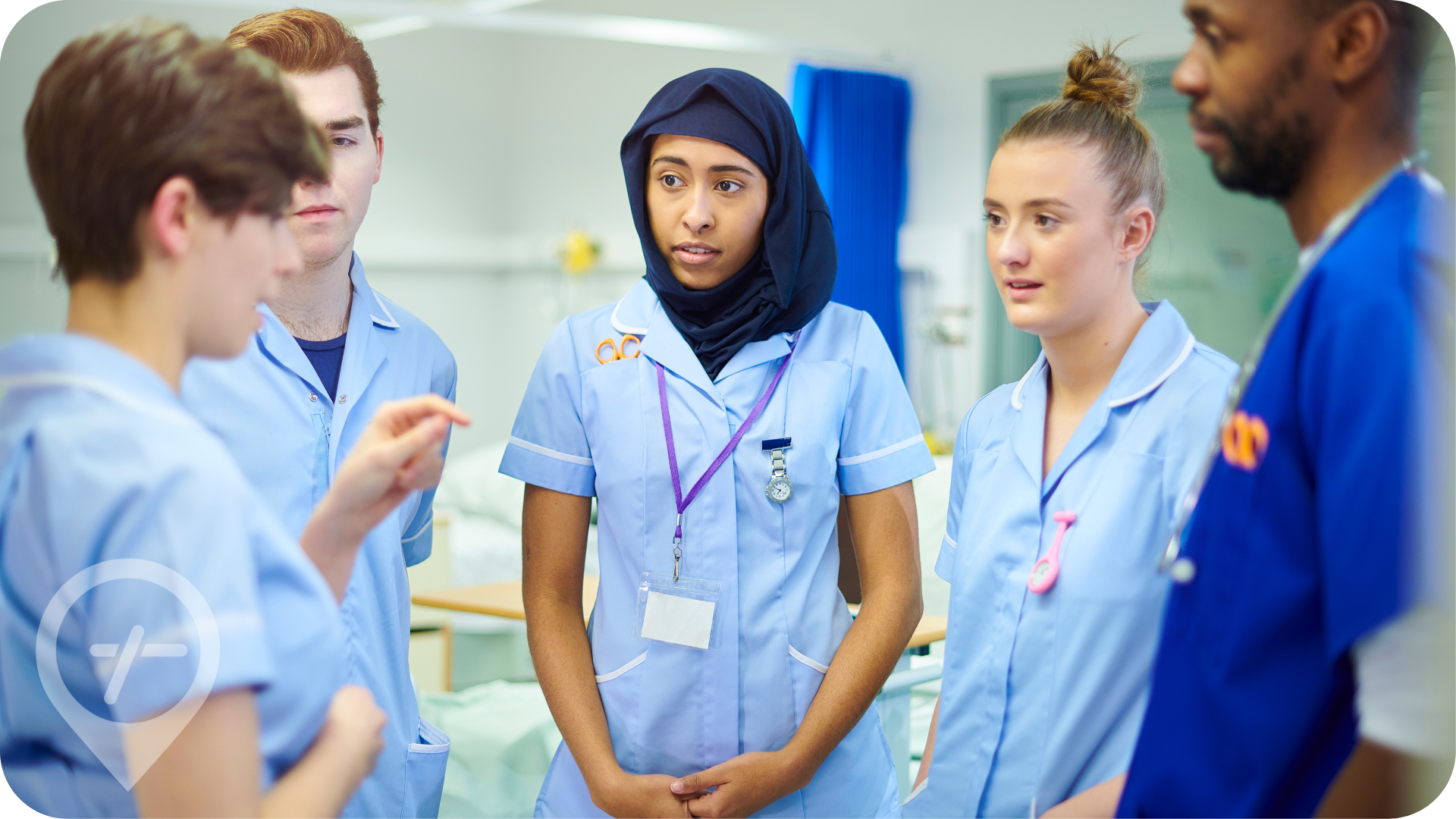 Group of diverse nurses discuss patient needs 