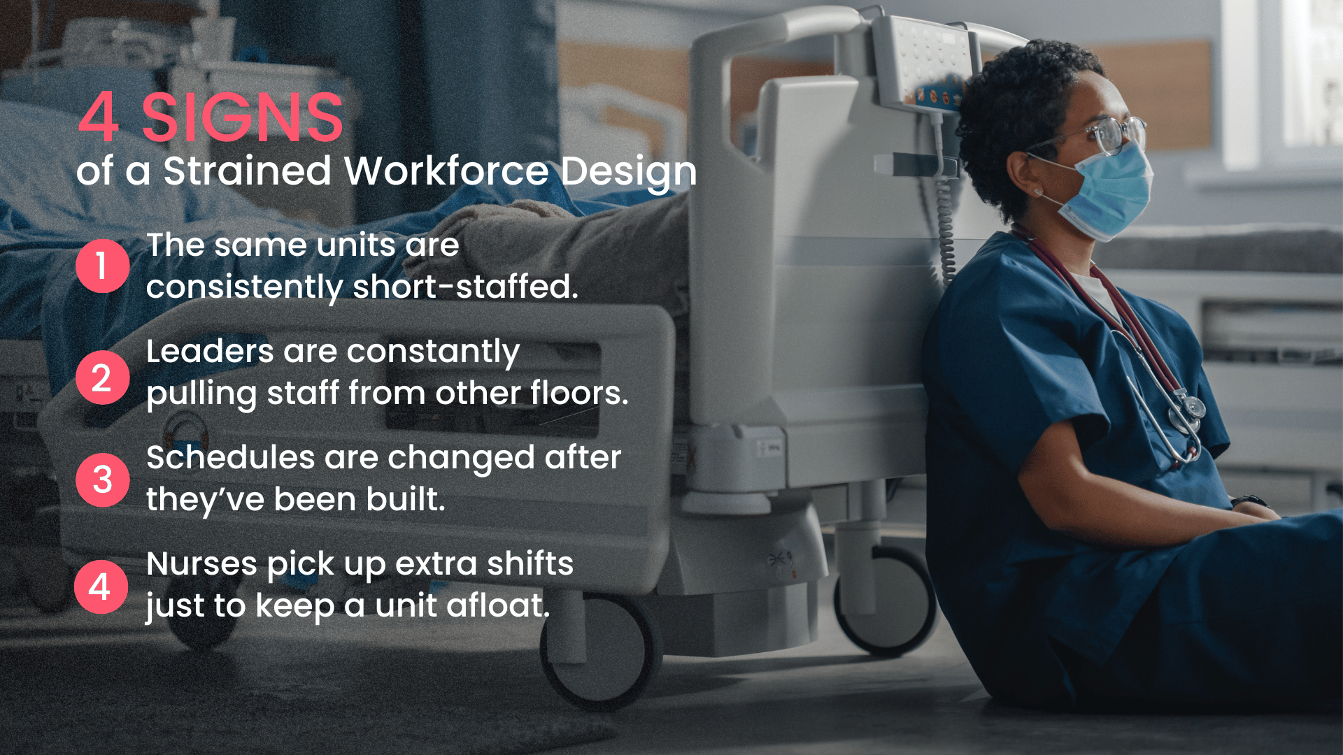 Nurse sitting on the floor at the end of an empty hospital bed in a hospital room, appearing exhausted and overwhelmed, illustrating nurse burnout and staffing strain in healthcare.