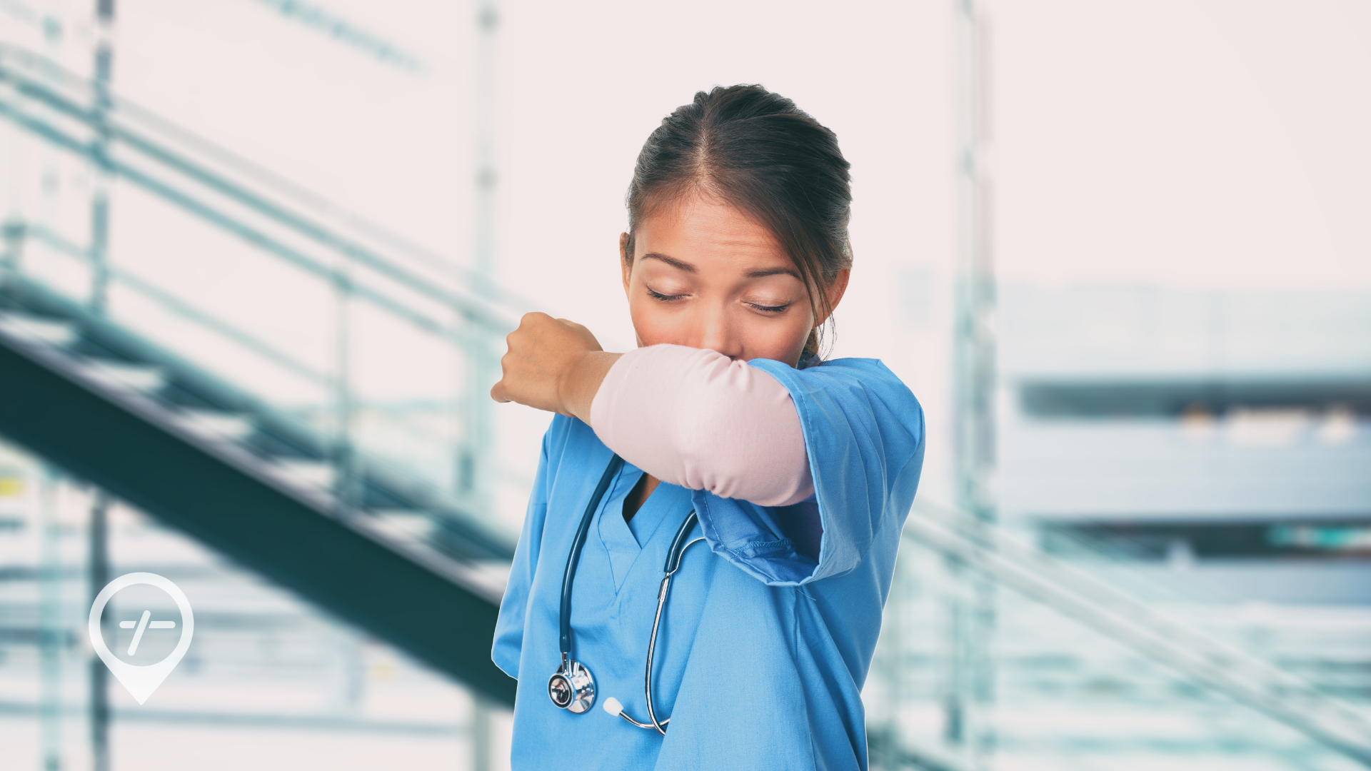 A nurse with seasonal allergies sneezes into her elbow.