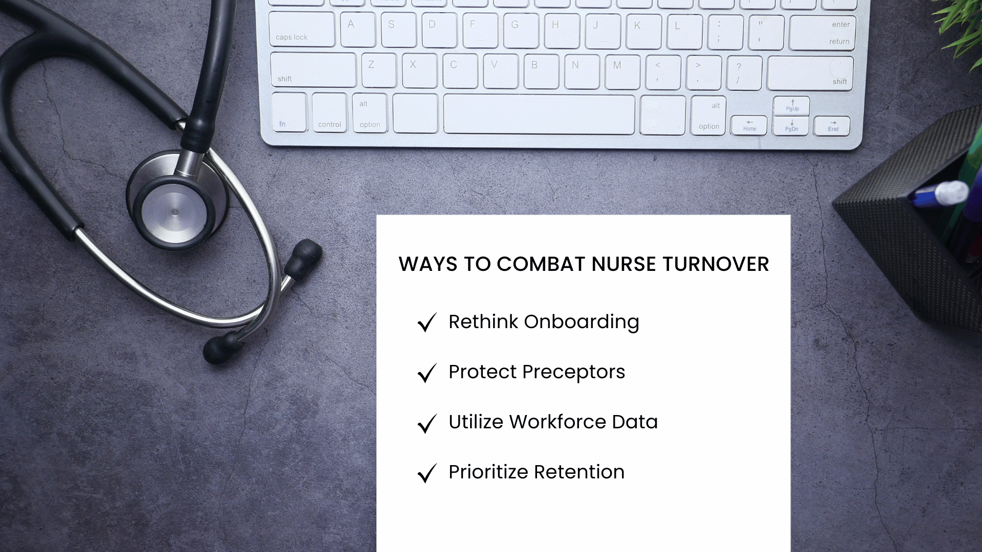 A work desk with a computer, stethoscope, and a piece of paper that lists ways to combat nurse turnover.