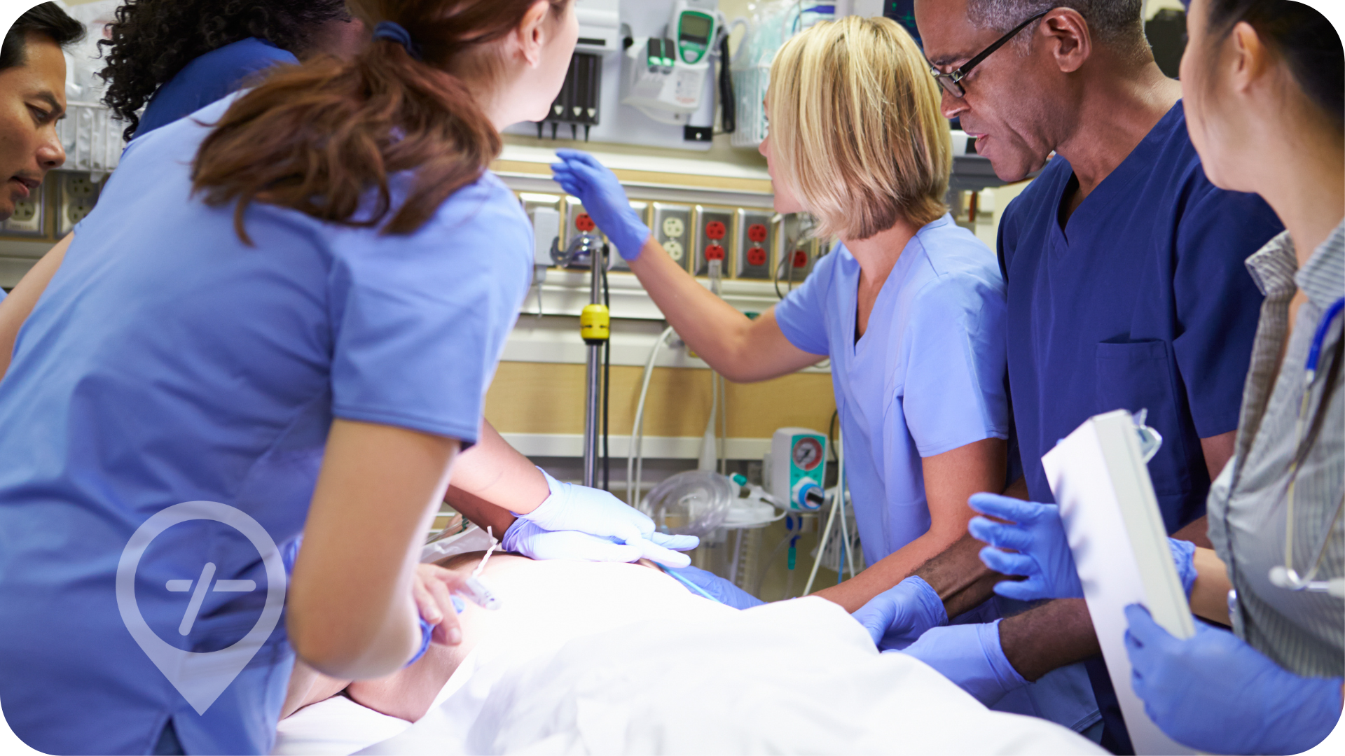 Full-time and part-time nursing staff support critical patient in emergency room.