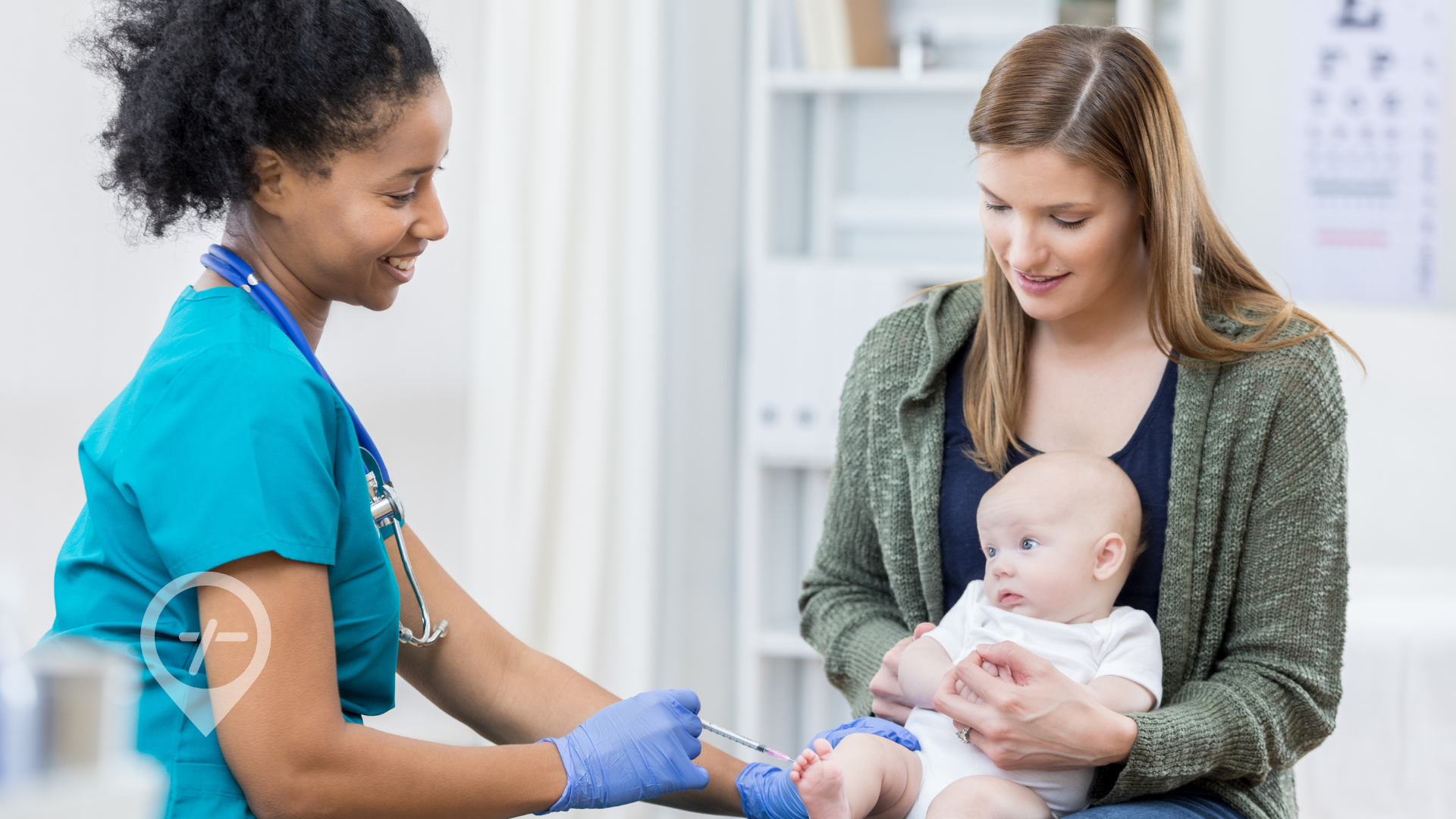 A nurse gives a baby a vaccination.