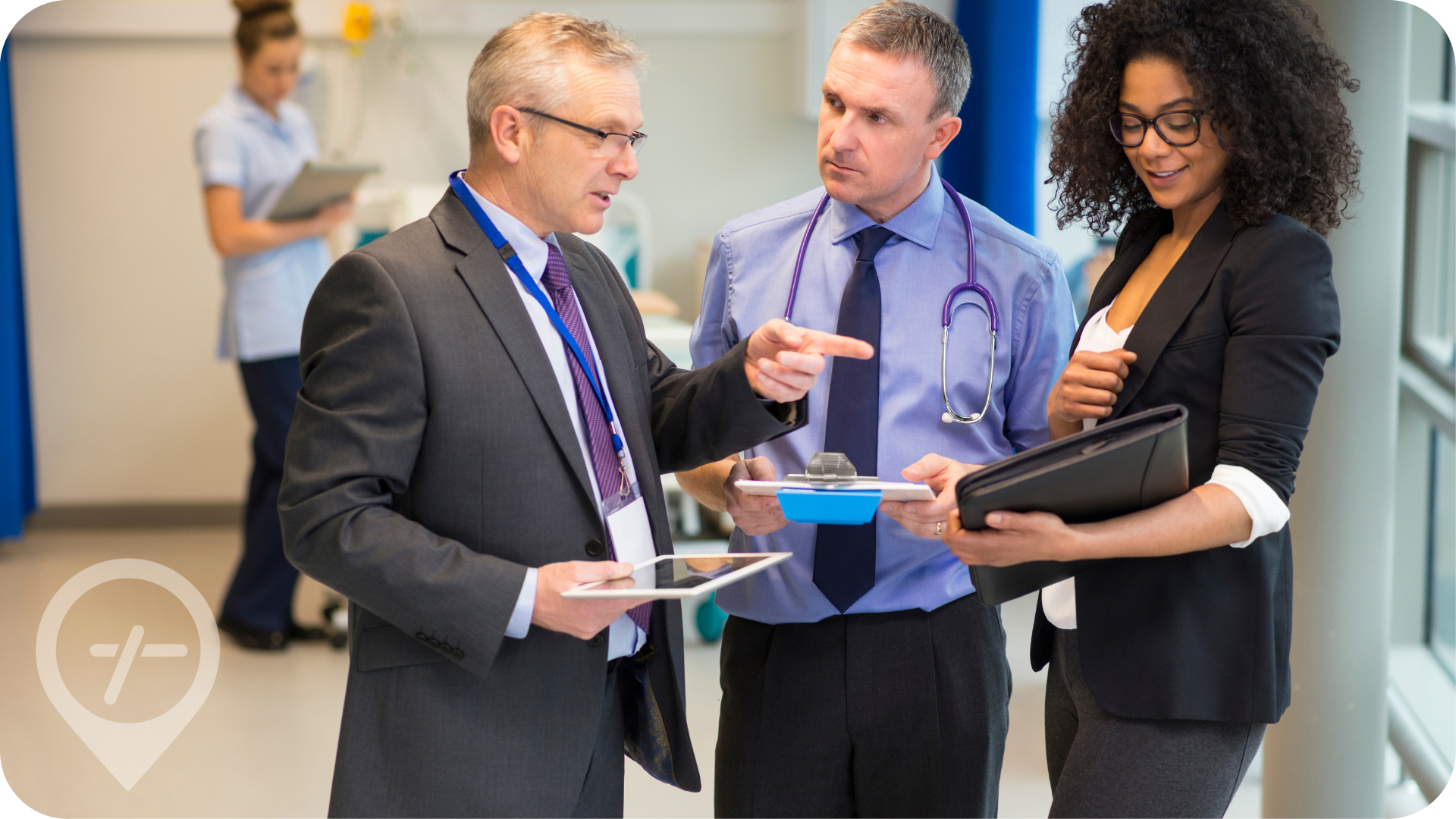 Group of healthcare executives examine technology options for hospital interoperability