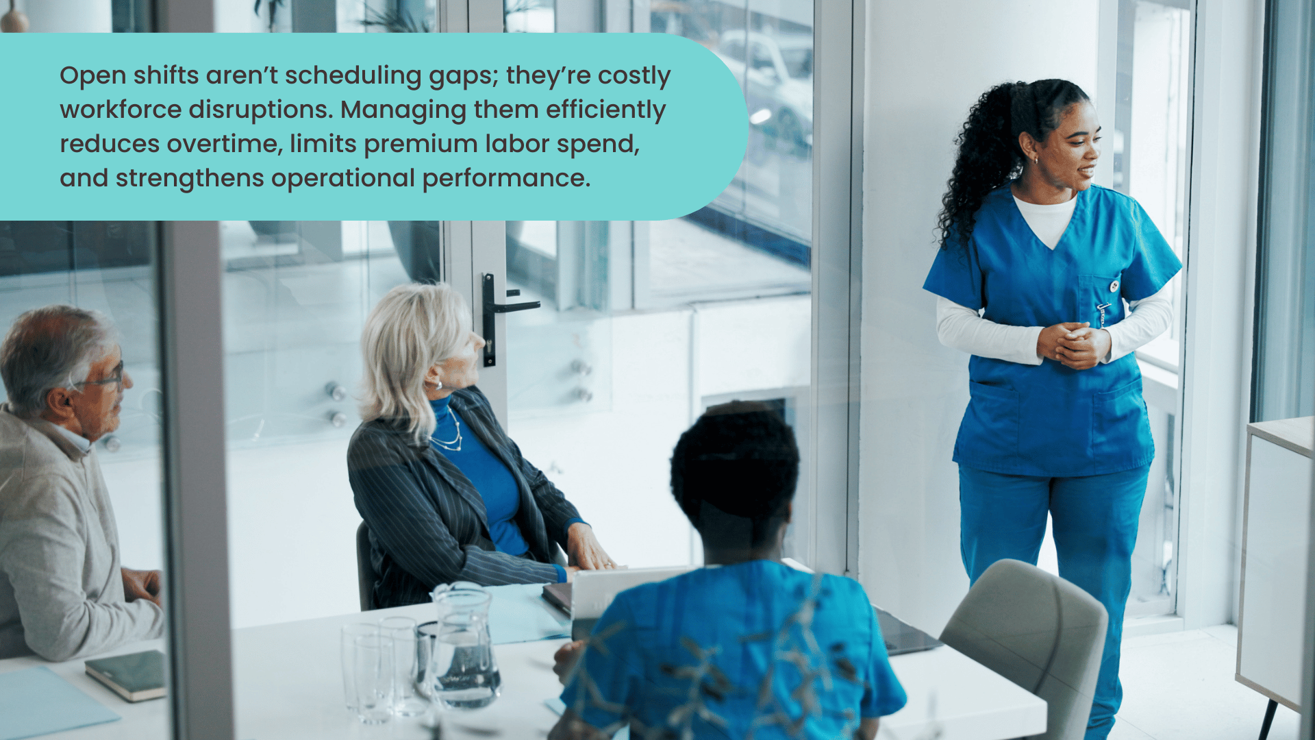 Nurses meeting with Chief Nursing Officer to discuss open shift management and reducing overtime costs in a hospital.