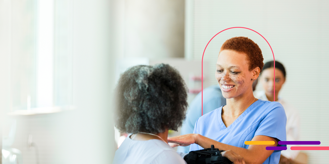 Nurse helping a woman with a brace on her arm.