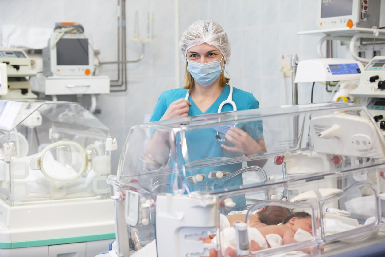 Neonatal Nurse with a baby in the hospital 
