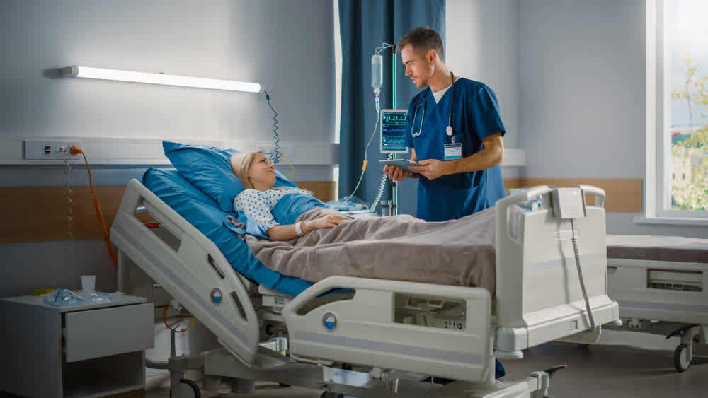 Step-down nurse monitoring a patient