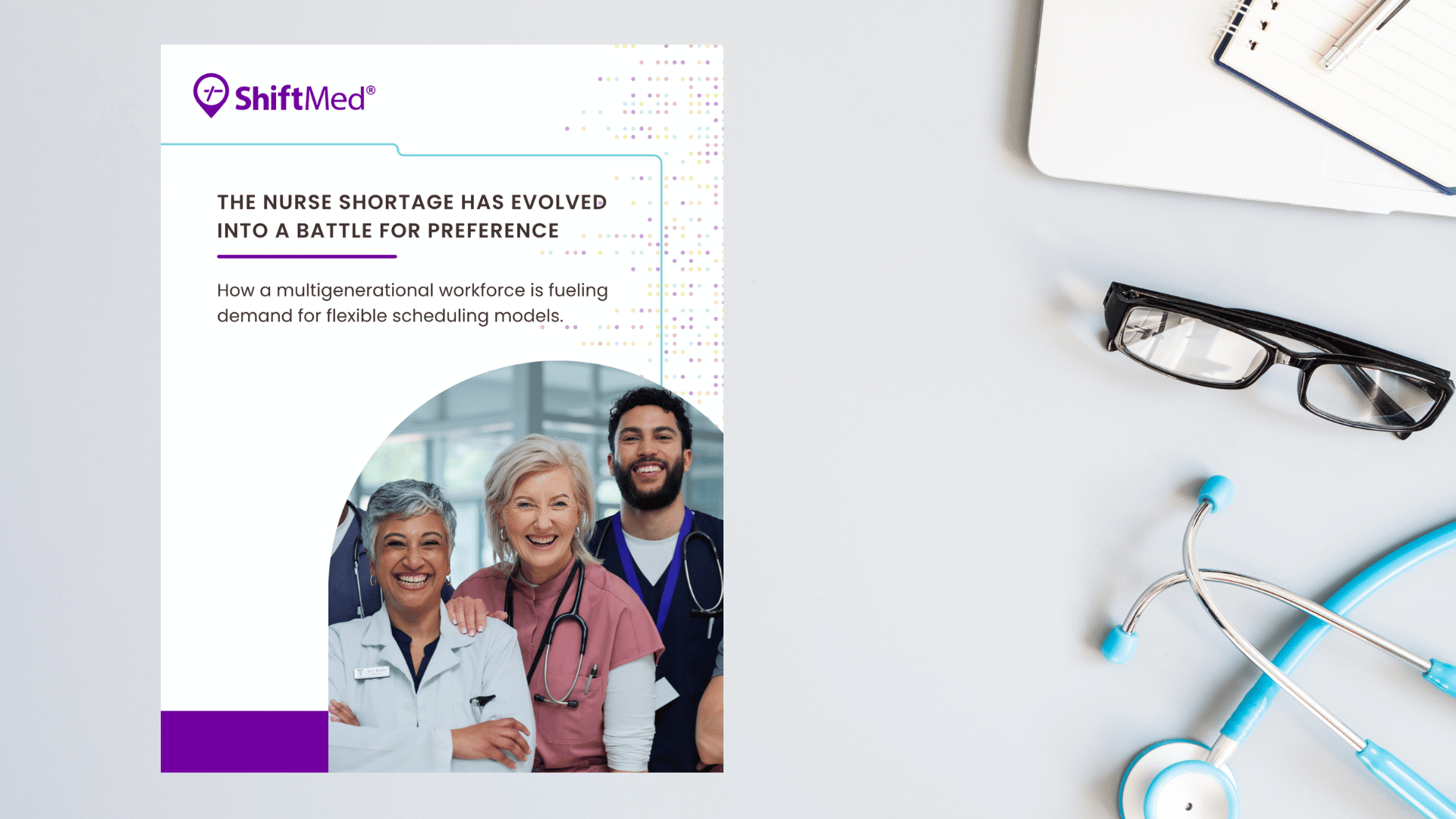 A desk with a stethoscope, computer, and a copy of the ShiftMed white paper on how a multigenerational nursing workforce is fueling demand for flexible float pool models.