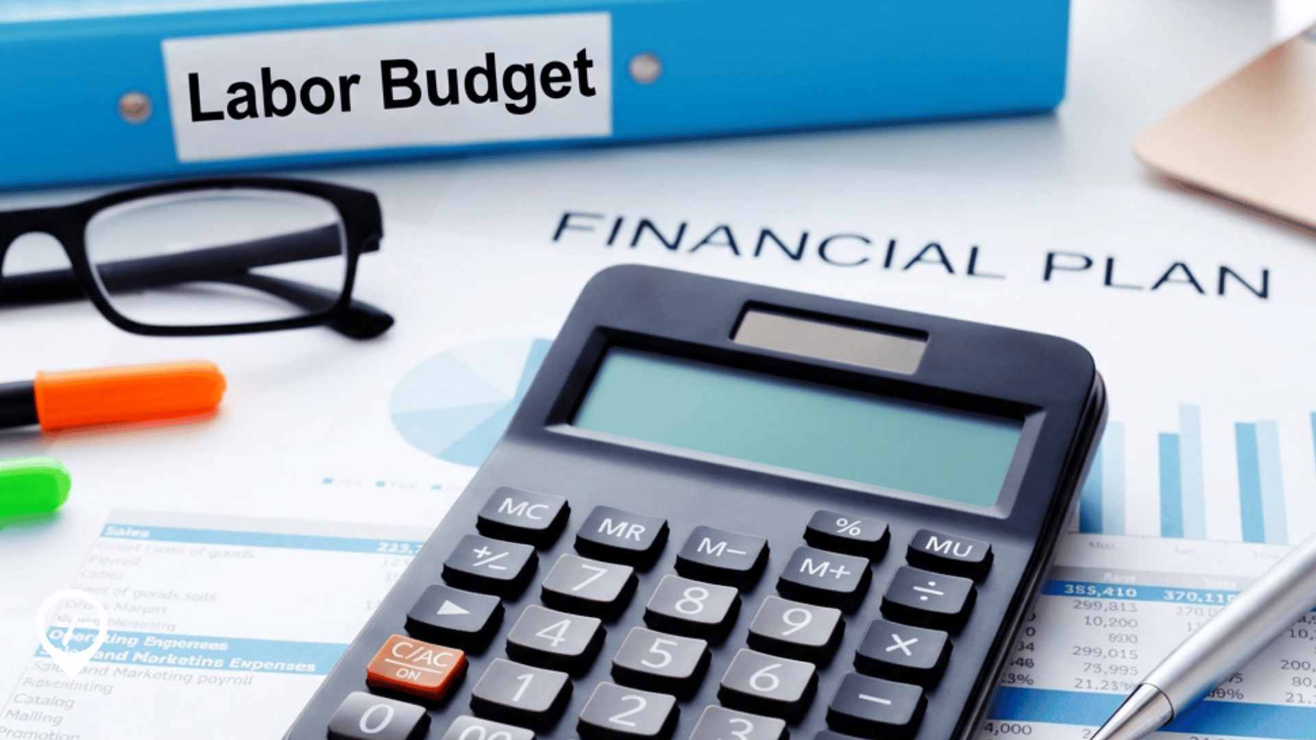 Respiratory-season labor budget binder on a healthcare finance leader's desk.