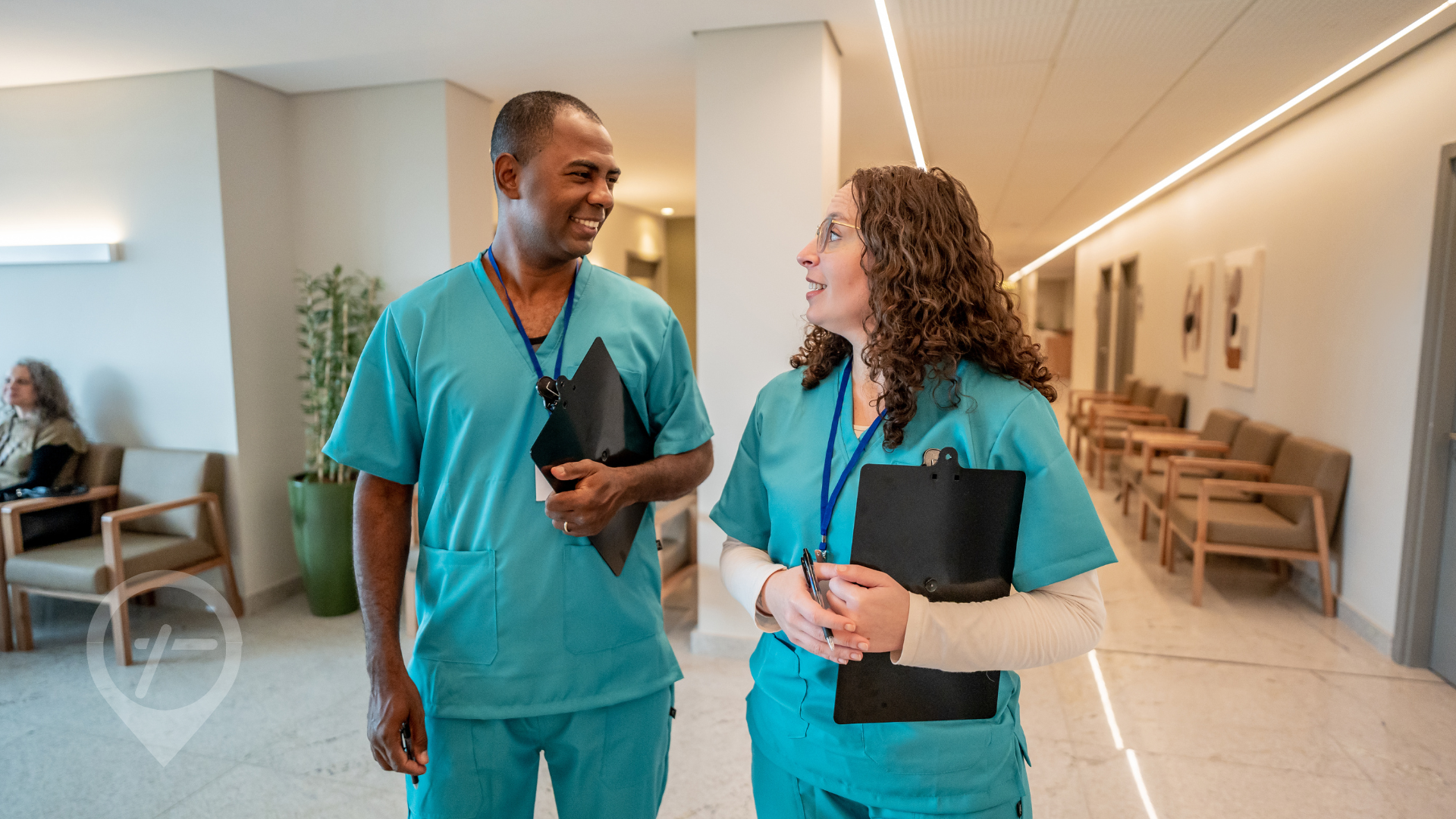 Per diem nursing professionals walk through hospital