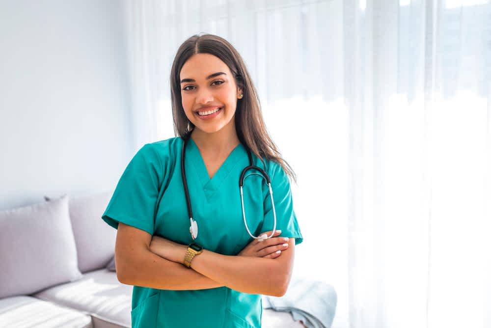 Travel Nurse smiling in the hospital