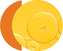 Bubbles floating in clear yellow liquid.