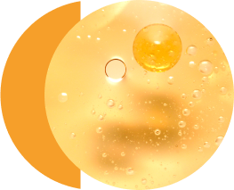  Bubbles floating in clear yellow liquid.