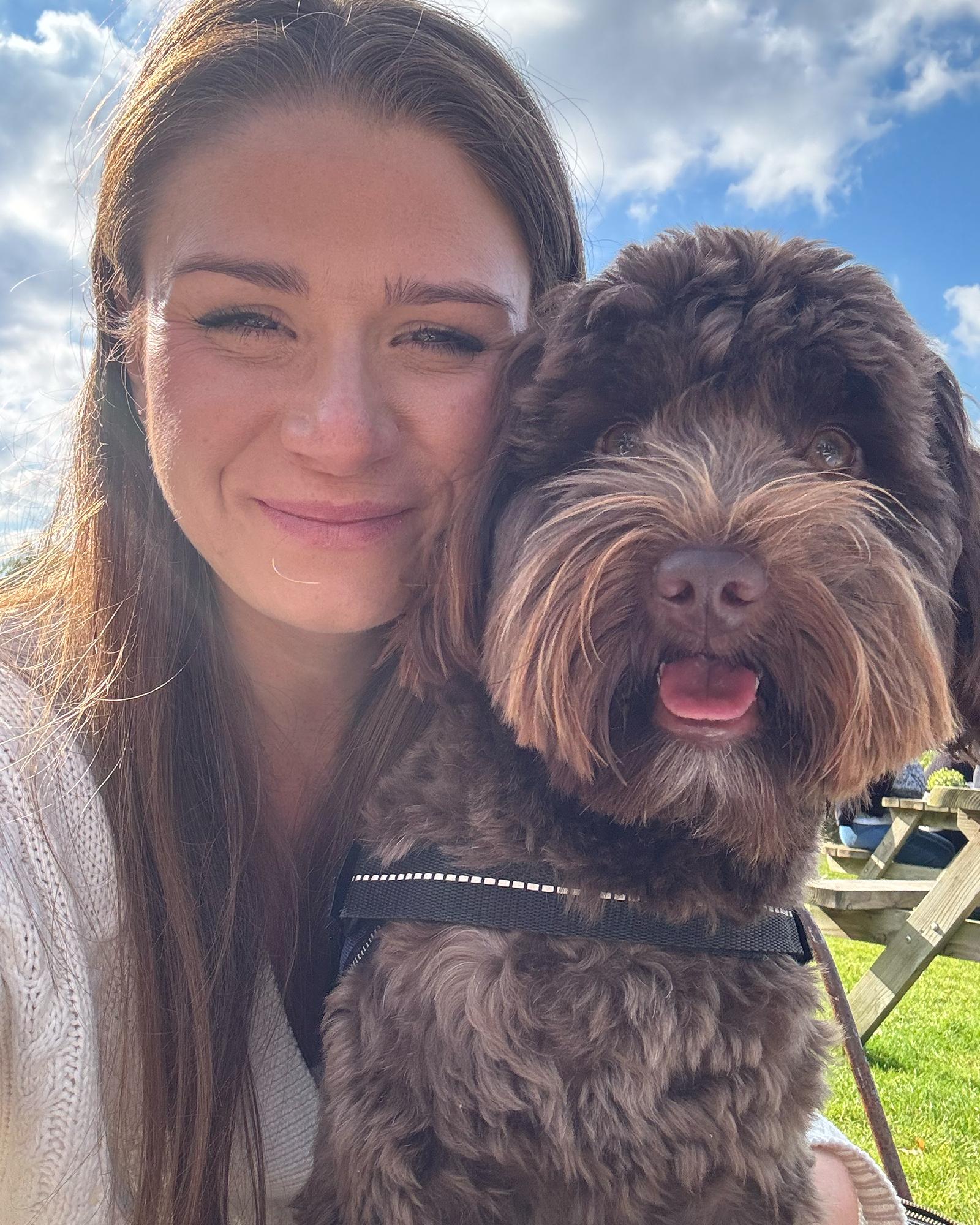 Dog Owner Smiling With Their Dog
