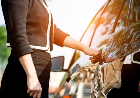 Person opening a car door