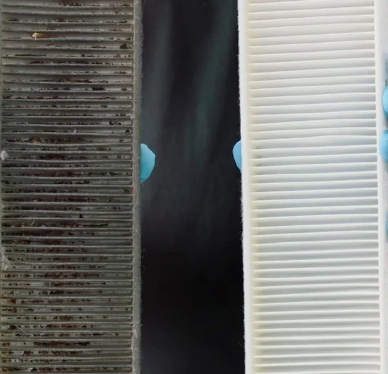 Two air filters. One used and one new