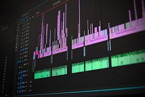 A close up of a computer monitor displaying video editing software.