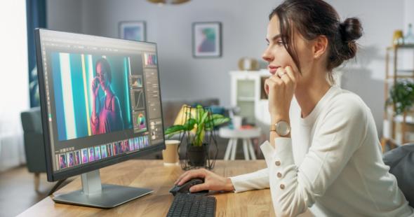 Woman using  Splashtop Personal to edit creative files 
