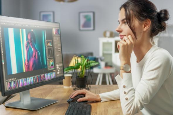 Woman using Splashtop Personal to edit creative files