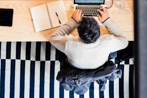 IT admin at desk using laptop for remote computer access