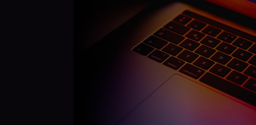 Picture of a laptop keyboard fading into darkness