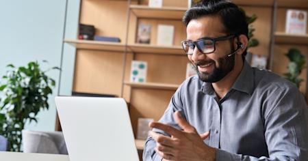 Male IT professional studying remote desktop solutions on a computer screen