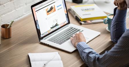 A remote worker is sharing his screen with his coworkers.