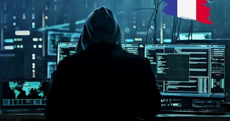 A French hacker in front of his computer.