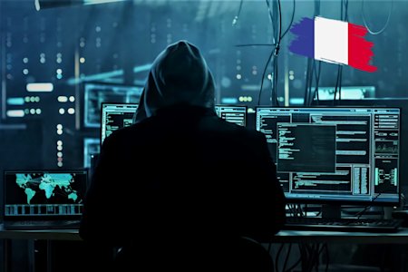 A French hacker in front of his computer.