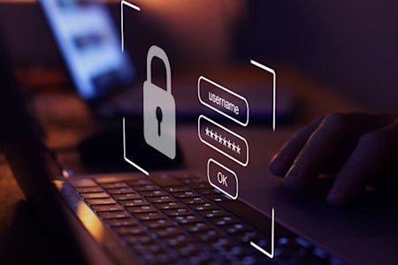 A person typing on a keyboard