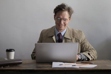 A person using a laptop.