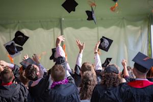 Students celebrating graduation.