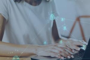 A person on a laptop using secure remote access software