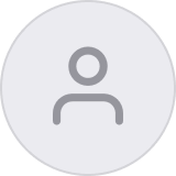 A gray, generic user profile icon featuring a simple outline of a person on a light gray circular background.
