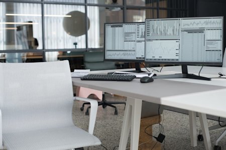 Desktop computers in an office.