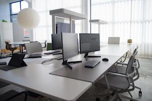 Desktop computers in an office.