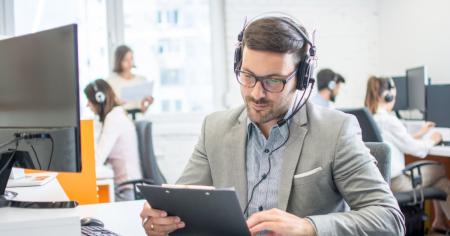 Man reading a case study titled Splashtop Remote Support Case Study with Midwest PROTECH