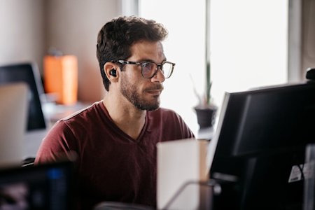 MSP technician working at his computer.