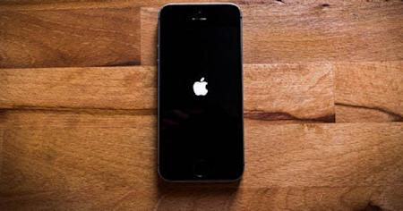 An iPhone on a desk