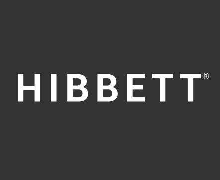 White, bold, capitalized text that reads HIBBETT on a dark gray background.