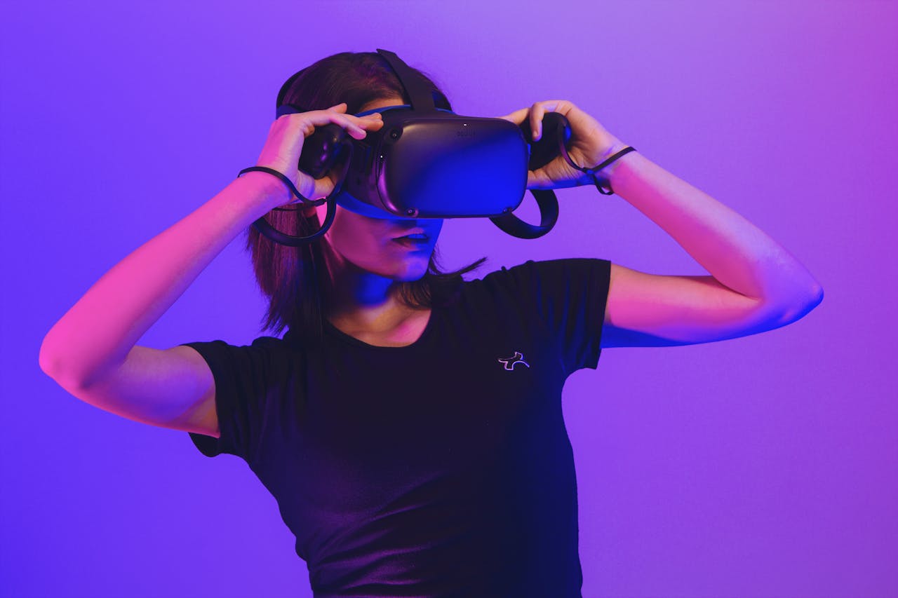 A woman wearing a VR headset.