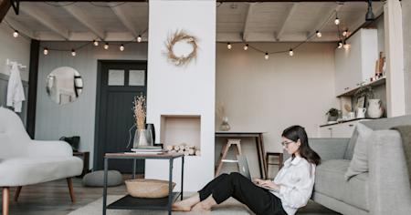 A woman working from here home using a laptop.