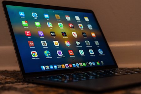 A computer with several third-party app icons.