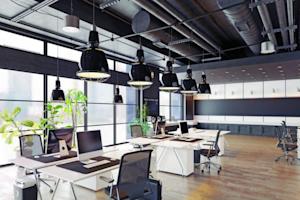 Empty IT workstations indicating a shortage of staff